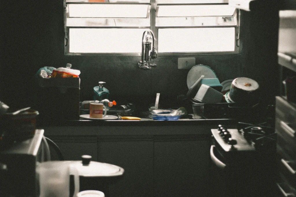 Messy kitchen before a professional cleaning