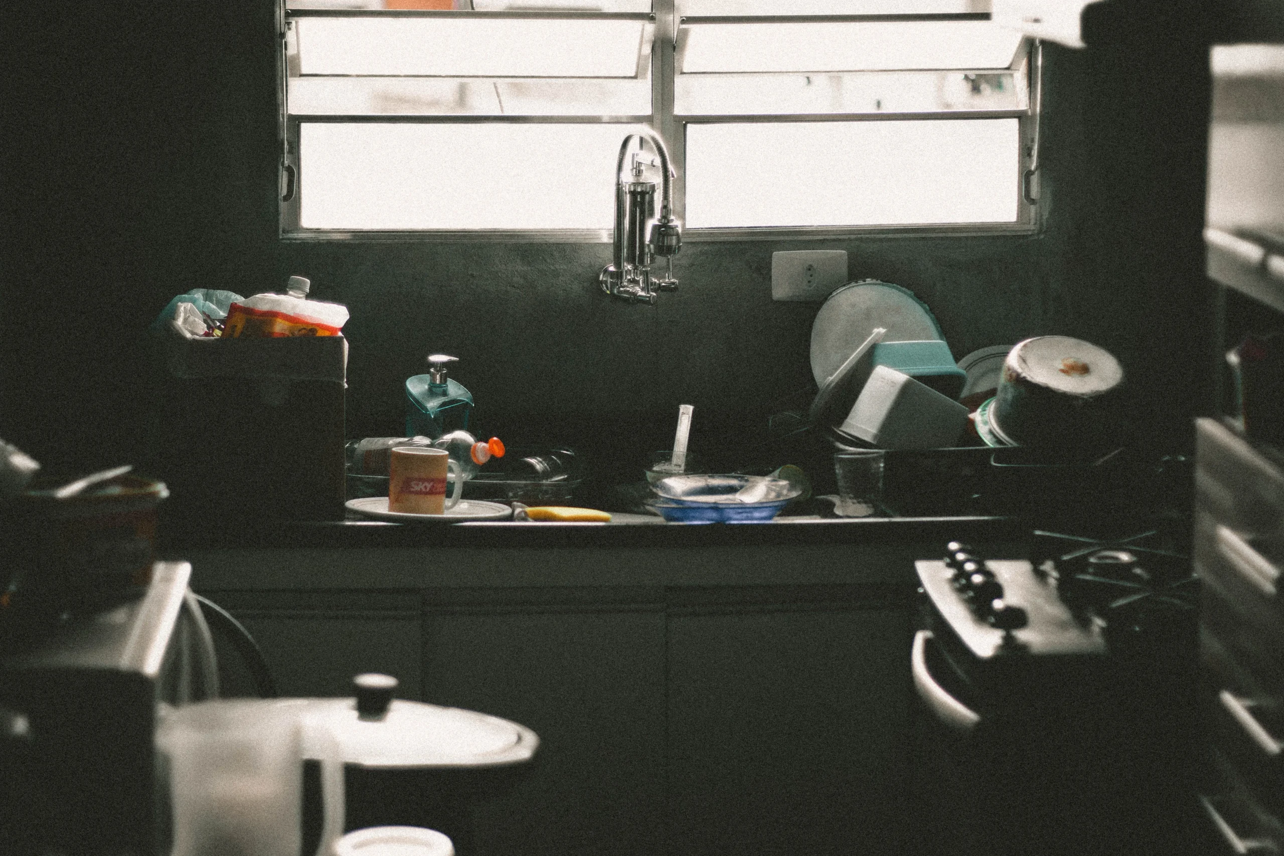 Messy kitchen before a professional cleaning