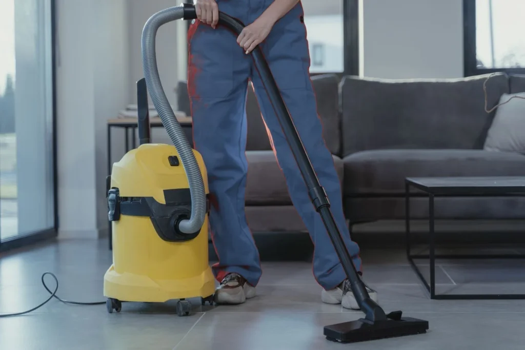 Professional cleaner wiping a surface in Ellenwood, GA