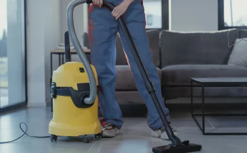 Professional cleaner wiping a surface in Ellenwood, GA